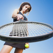 Caucasian woman playing tennis