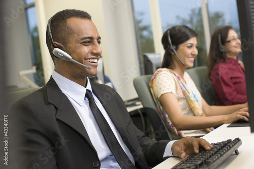 Photo: Indian business people working on office Indian business people working on office