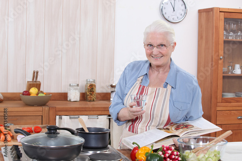 Photo: Old woman cooking Old woman cooking