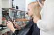Woman Looking At Digital Tablet
