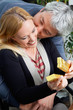 Middle Aged Man Kissing Woman