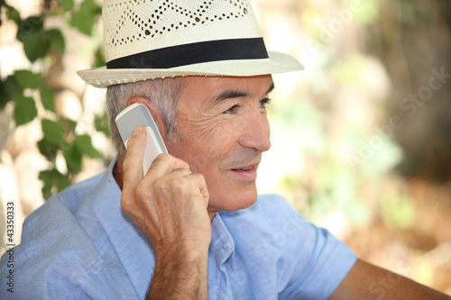 Photo: Senior man on the phone Senior man on the phone