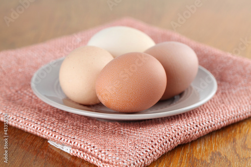 Photo: Organic chicken eggs on a plate Organic chicken eggs on a plate