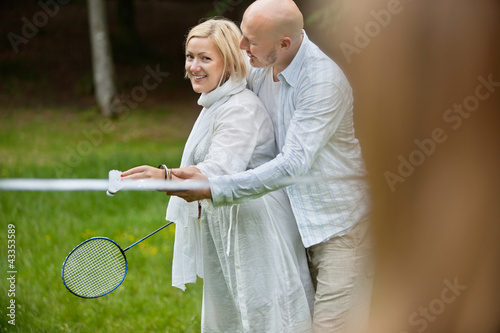 Photo: Couple Playing Badminton Together Couple Playing Badminton Together