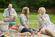 Photo: Happy Friends On An Outdoor Picnic Happy Friends On An Outdoor Picnic