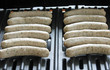 Würstchen am Griller