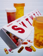 Pills falling out of weekly pill organizer