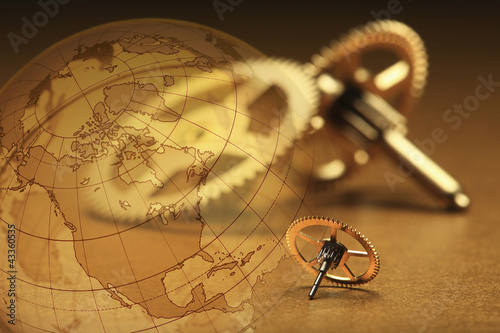 Photo: Montage of sprockets and globe Montage of sprockets and globe