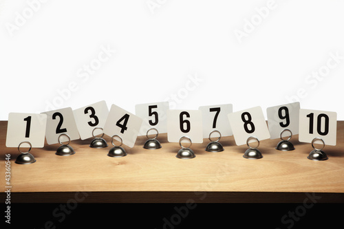 Photo: Number cards on place card holders Number cards on place card holders