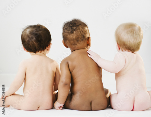 Photo: Nude babies sitting on floor Nude babies sitting on floor