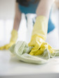 Close up of Korean woman wiping counter