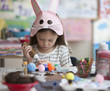 Caucasian making rabbit mask