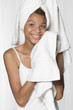 Mixed race teenager drying her face