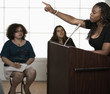 Teenage girl giving speech to classmates
