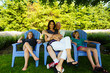 Family of four sitting outside