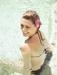 Photo: Overhead view of woman laughing sitting in pool at a luxury resort in Napa Valley, California Overhead view of woman laughing sitting in pool at a luxury resort in Napa Valley, California