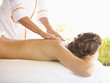 Rear view of woman receiving massage therapy at a luxury resort and spa in Napa Valley California
