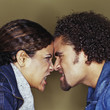Grimacing couple having argument