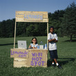 Children with wi-fi enabled lemonade stand