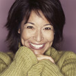 Grinning mixed race woman
