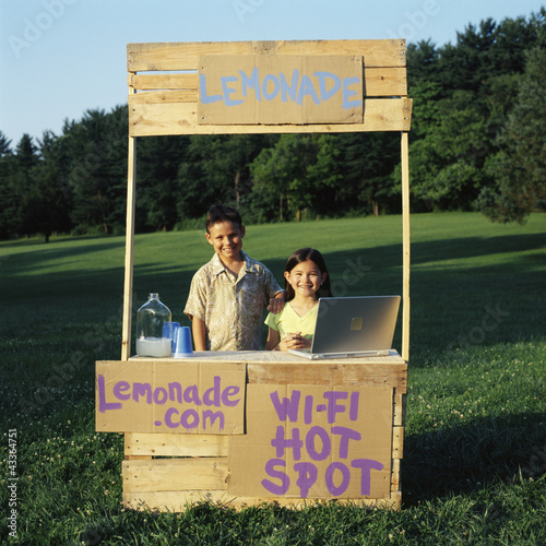 Photo: Children with wi-fi enabled lemonade stand Children with wi-fi enabled lemonade stand