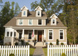 Front yard of house and picket fence