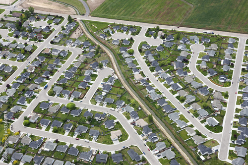 Photo: Aerial view of houses in community development Aerial view of houses in community development