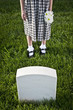 Caucasian girl visiting cemetery