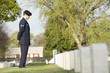 Caucasian soldier visiting cemetery
