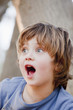 Surprised Caucasian boy
