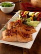 Grilled sockeye salmon with vegetable skewers