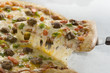 Sausage pizza being served