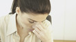 Frustrated Hispanic businesswoman