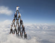 Business people making a human pyramid