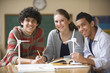 Teenage students studying wind power