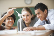 Teenage students studying wind power
