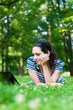 Beautiful young woman  using her laptop outdoors