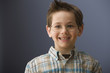 Smiling Caucasian boy wearing eyeglasses