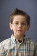 Serious Caucasian boy wearing eyeglasses