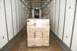 Worker operating forklift in truck