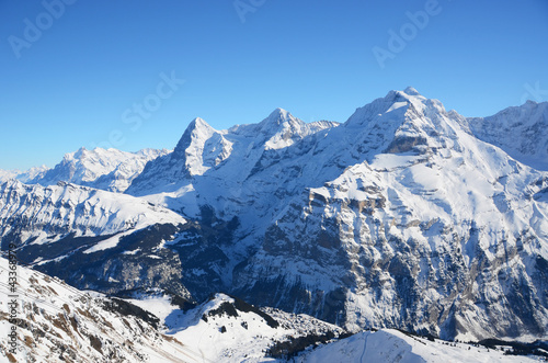Photo: Eiger, Moench and Jungfrau, famous Swiss mountain peaks Eiger, Moench and Jungfrau, famous Swiss mountain peaks