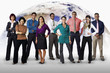 Diverse business people standing together with globe in background