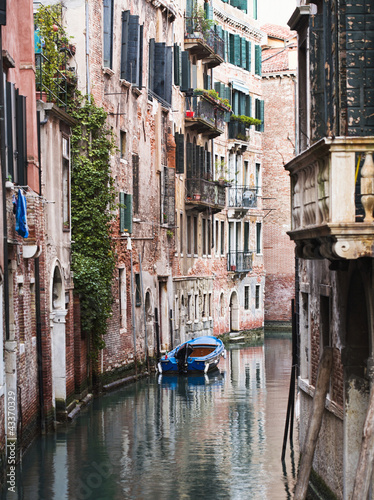 Photo: Boat moored in ornate canal Boat moored in ornate canal