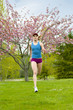 Mixed race woman running outdoors