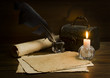 old papers and books on a wooden table