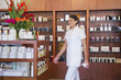 Aesthetician working in beauty product store