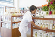 Aesthetician working in beauty product store
