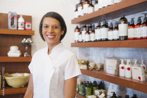 Photo: Aesthetician standing in beauty product store Aesthetician standing in beauty product store