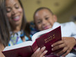 Mother and son reading bible