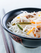 rice noodles with vegetables, mushrooms and meat